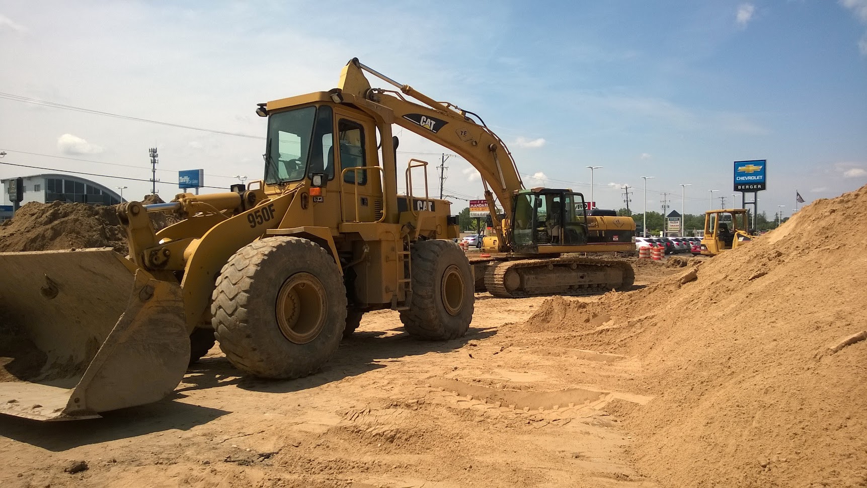 CAT excavator and earthmoving equipment on large civil stormwater and drainage improvement project — Montgomery Drain Project